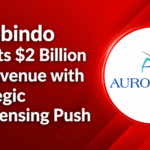 A red gradient news-style thumbnail featuring the Aurobindo logo and the headline “Aurobindo Targets $2 Billion US Revenue with Strategic In-Licensing Push”.