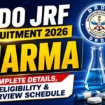 DRDO JRF Recruitment 2026 pharma thumbnail featuring DRDO logo, medicine bottle, lab flask, tablets, and bold text about eligibility and interview schedule.