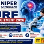 NIPER Ahmedabad JRF Recruitment 2026 thumbnail featuring a scientist using a microscope, brain research graphics, salary details, and application deadline for neuroscience research opportunity.