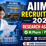 AIIMS Bhubaneswar Recruitment 2026 thumbnail featuring a female researcher in a laboratory, AIIMS Bhubaneswar building background, Research Associate-I vacancy, and eligibility for M.Pharm and PhD candidates.