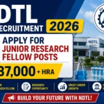 NDTL JRF Recruitment 2026 thumbnail featuring NDTL laboratory imagery, microscope, research equipment, and a recruitment announcement for Junior Research Fellow (JRF) posts with a salary of ₹37,000 plus HRA.