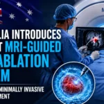 Australia's first MRI-guided cryoablation system featured in a medical treatment setting, showing doctors performing a minimally invasive tumor-freezing procedure using MRI imaging technology.