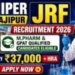 NIPER Hajipur JRF Recruitment 2026 thumbnail featuring a research scientist, laboratory equipment, NIPER Hajipur campus, DNA graphics, and recruitment details highlighting M.Pharm and GPAT-qualified candidate eligibility with a salary of ₹37,000 plus HRA.