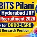 BITS Pilani Hyderabad JRF Recruitment 2026 thumbnail with DRDO-LSRB logo, microscope, research laboratory elements, and yellow gradient background highlighting funded research position.