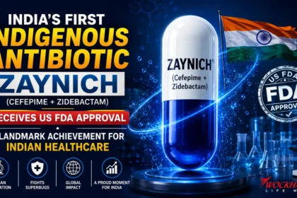 YouTube thumbnail featuring a large futuristic Zaynich antibiotic capsule with the Indian flag, US FDA approval seal, laboratory glassware, and microscope on a blue scientific background highlighting India's first indigenous antibiotic approved by the US FDA.