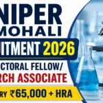 NIPER Mohali Recruitment 2026 thumbnail featuring a laboratory microscope, scientific glassware, and recruitment announcement for the Post-Doctoral Fellow/Research Associate position with a salary of ₹65,000 + HRA.