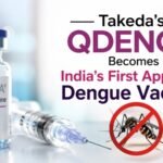 Takeda QDENGA becomes India's first approved dengue vaccine with vaccine vial, syringe, and mosquito illustration