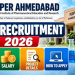 NIPER Ahmedabad JRF Recruitment 2026 thumbnail featuring NIPER Ahmedabad, eligibility, salary, project details and application information with laboratory imagery.